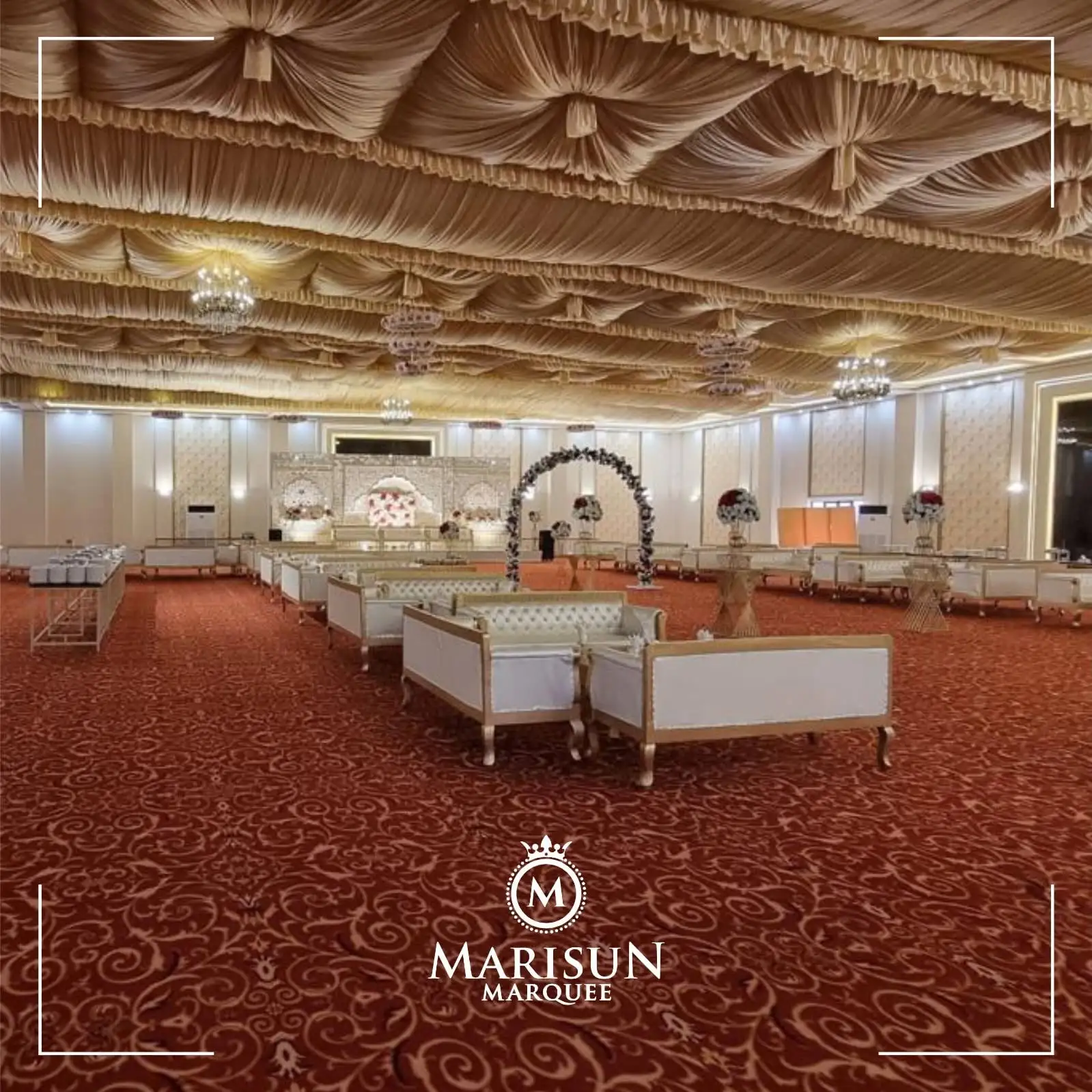 Buffet service under draped ceiling with chandeliers